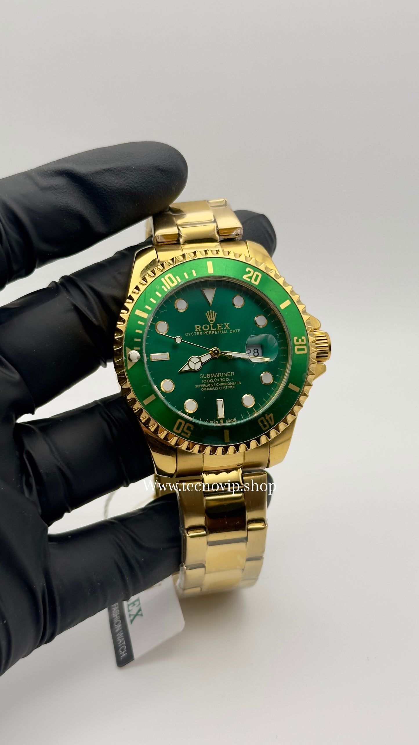 ROLEX SUBMARINER GOLD AND GREEN