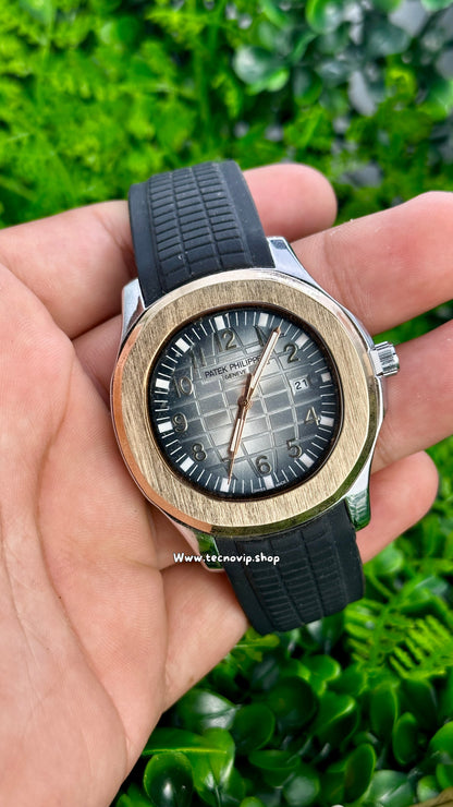 PATEK PHILIPPE BLACK WHITE AND GOLD