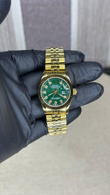 ROLEX GIRL GOLD AND GREEN DARK