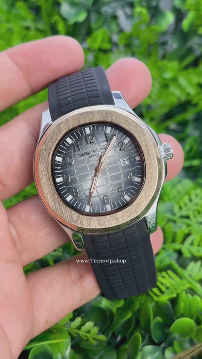 PATEK PHILIPPE BLACK WHITE AND GOLD